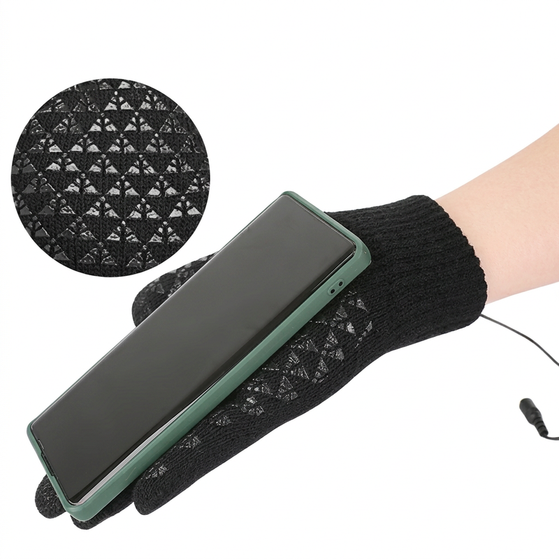 Holding a smartphone in a black heated glove, with a close-up of the silicone palm grip